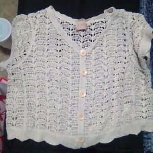 See threw crochet type button up size large